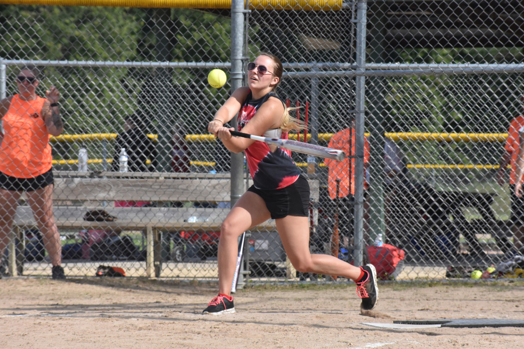 Marie Kallas hits softball